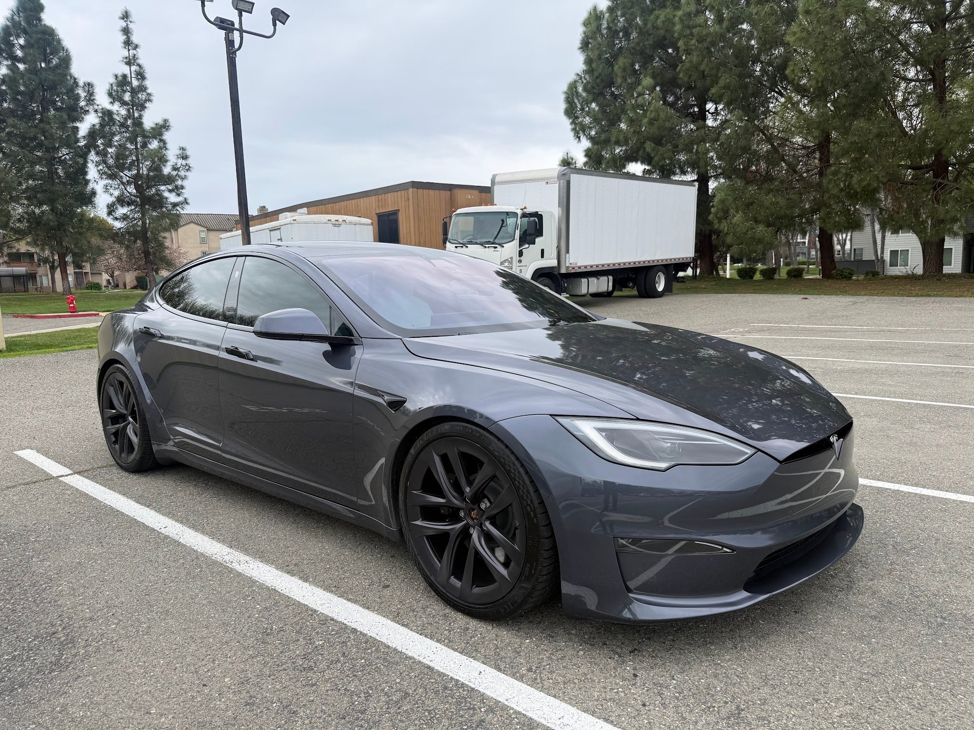 Gray Tesla Model S parked outside, front three-quarter view, serviced by RideRite Mobile Auto Services in the Bay Area