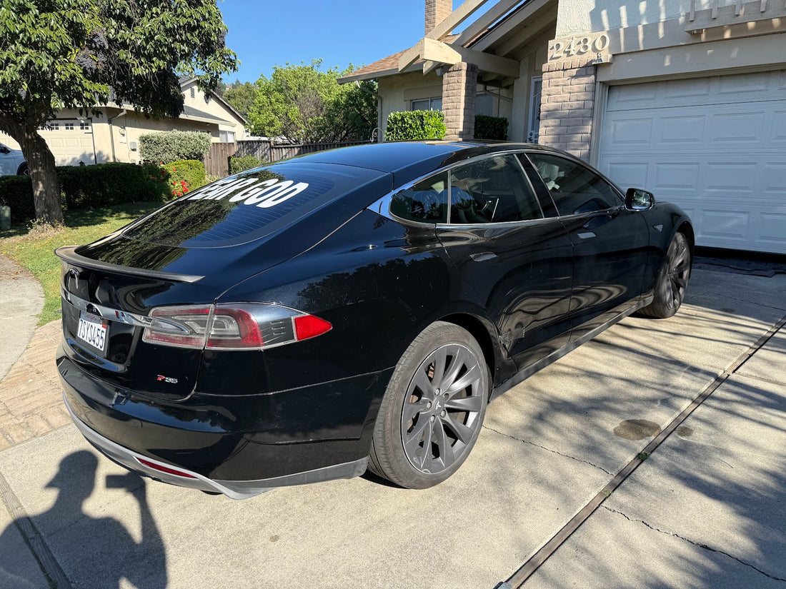 Black Tesla Model S parked in a Bay Area driveway during a mobile suspension service call