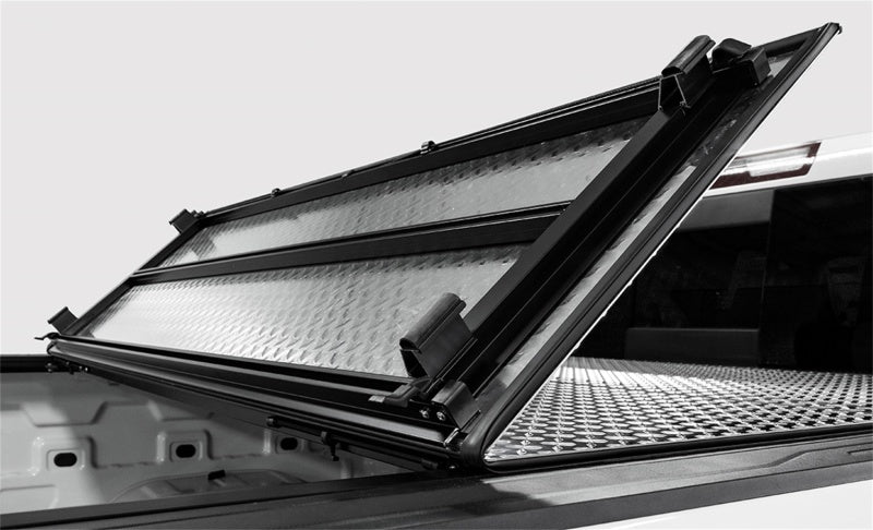 Access LOMAX Tri-Fold Cover Black Urethane - 07-13 Chevy Silverado 1500 5ft 8in Bed (Except Classic) B3020059