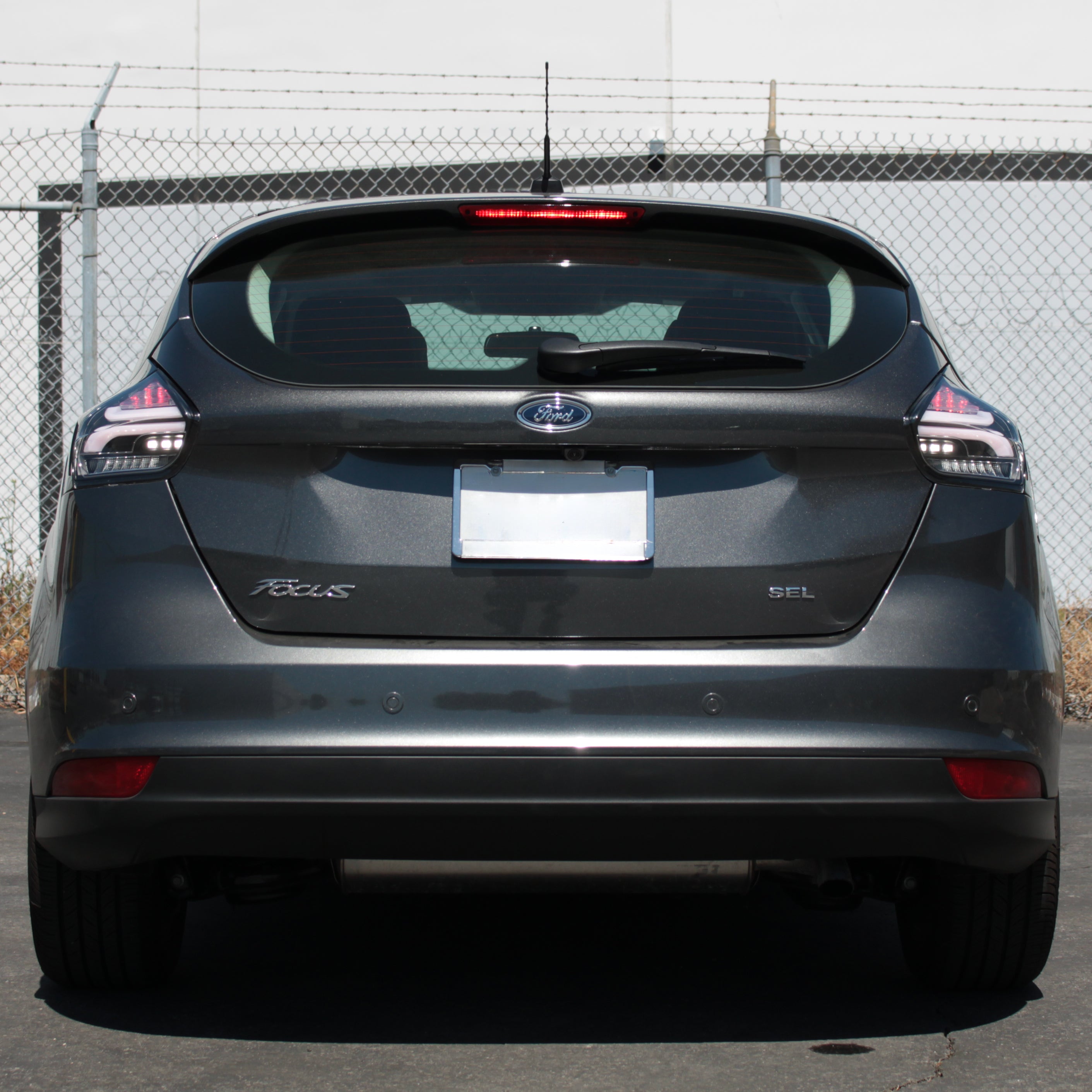 Spyder 15-17 Ford Focus Hatchback LED Tail Lights w/Indicator/Reverse - Black (ALT-YD-FF155D-LED-BK) 5085719