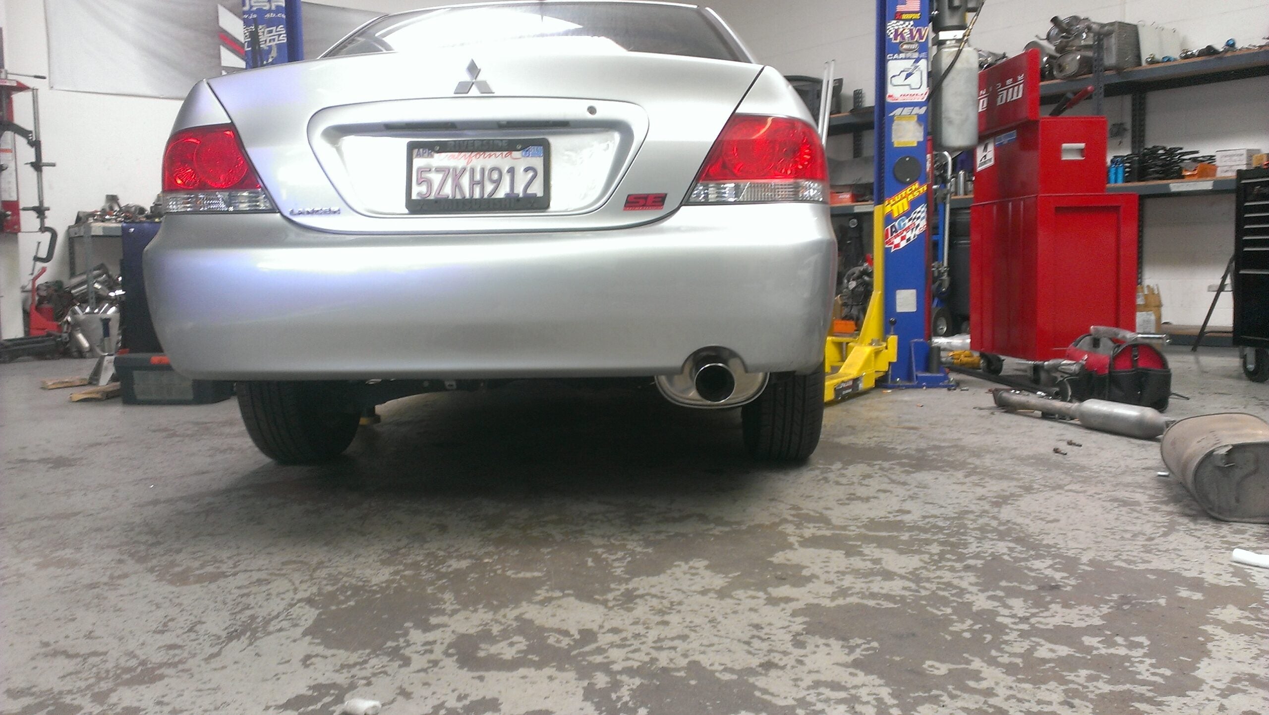 Megan Racing Cat-Back Exhaust System for 2002-2006 Mitsubishi Lancer - Stainless Rolled Tips (view 9)