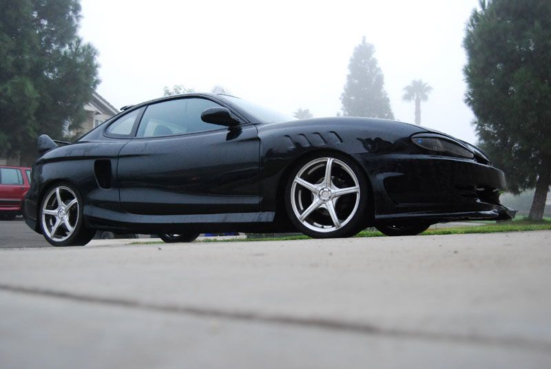 Megan Racing Coilover Damper Kit for Hyundai Tiburon 97-01 - 32-Level Adjustment, Camber Pillowball Front Mounts (view 4)